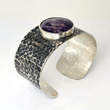 Silver cuff with chevron amethyst