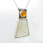 Rutile quartz and amber